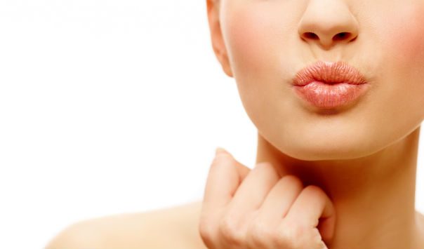 woman puckering her lips