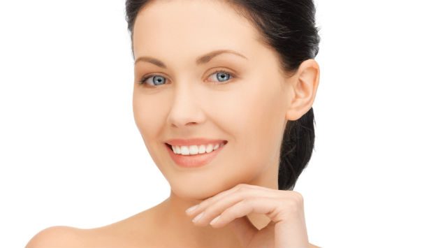 woman with dark hair and blue eyes