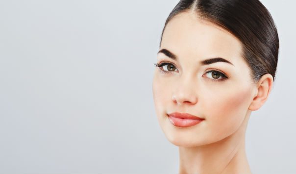 woman with her dark hair slicked back